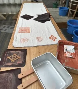 Examples of Cyanotypes on a workbench - Indigo
