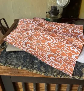 Cyanotype example laid out on a table - Indigo