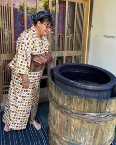 Indigo Image - Jennie overlooking a vat
