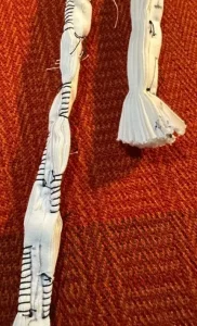 Close up of white tassles - Indigo